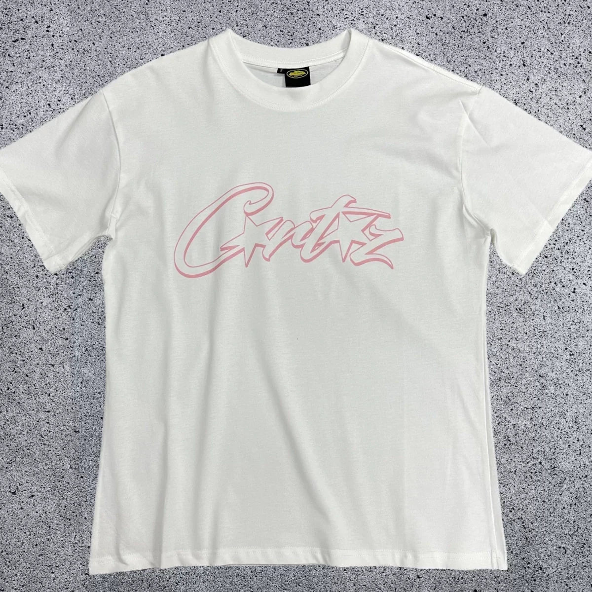 Corteiz Pink Accent Star-Logo Graphic Tee - White & Pink Streetwear T-Shirt